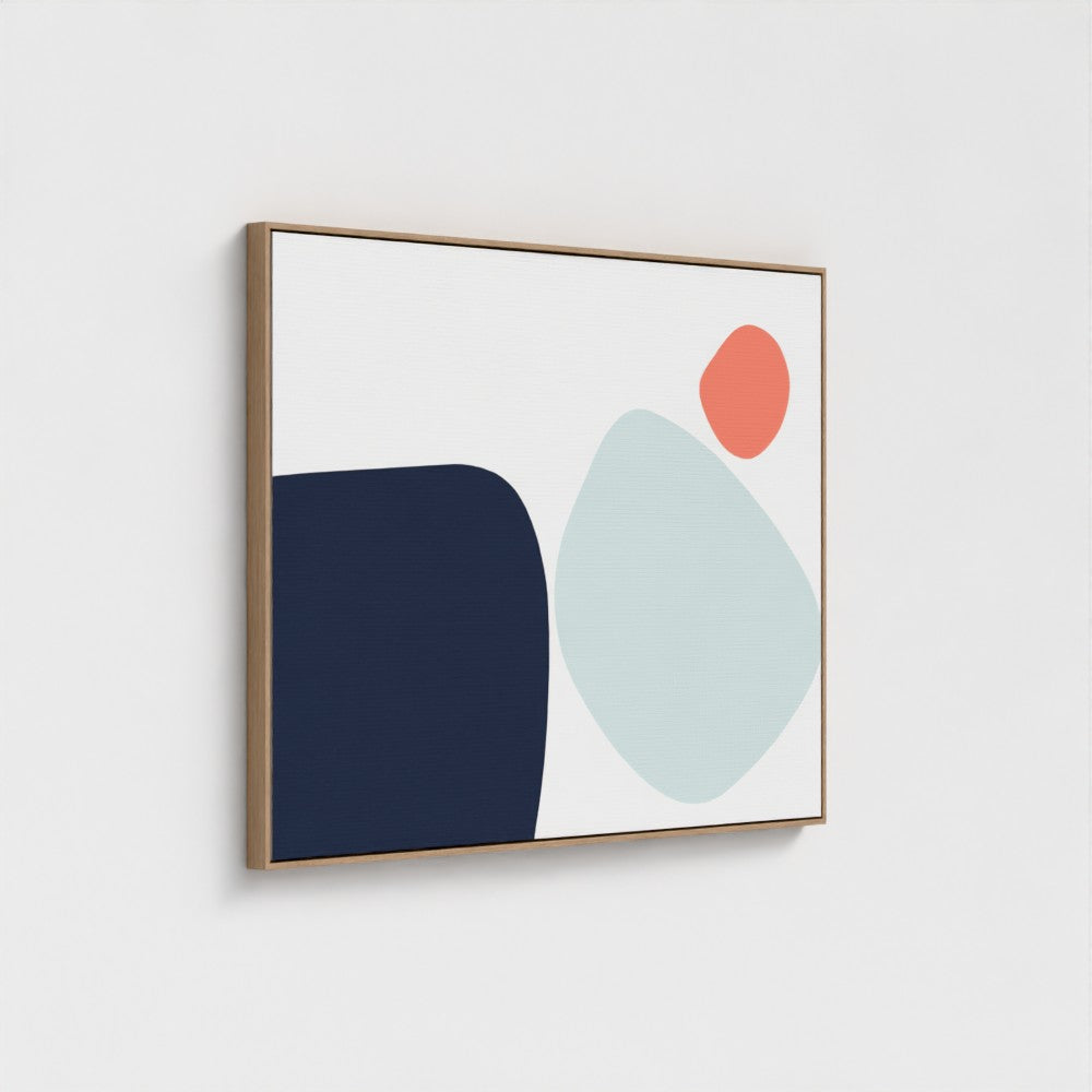 Framed artwork featuring irregular solid-colored shapes on a white background.