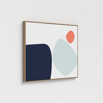 Framed artwork featuring irregular solid-colored shapes on a white background.